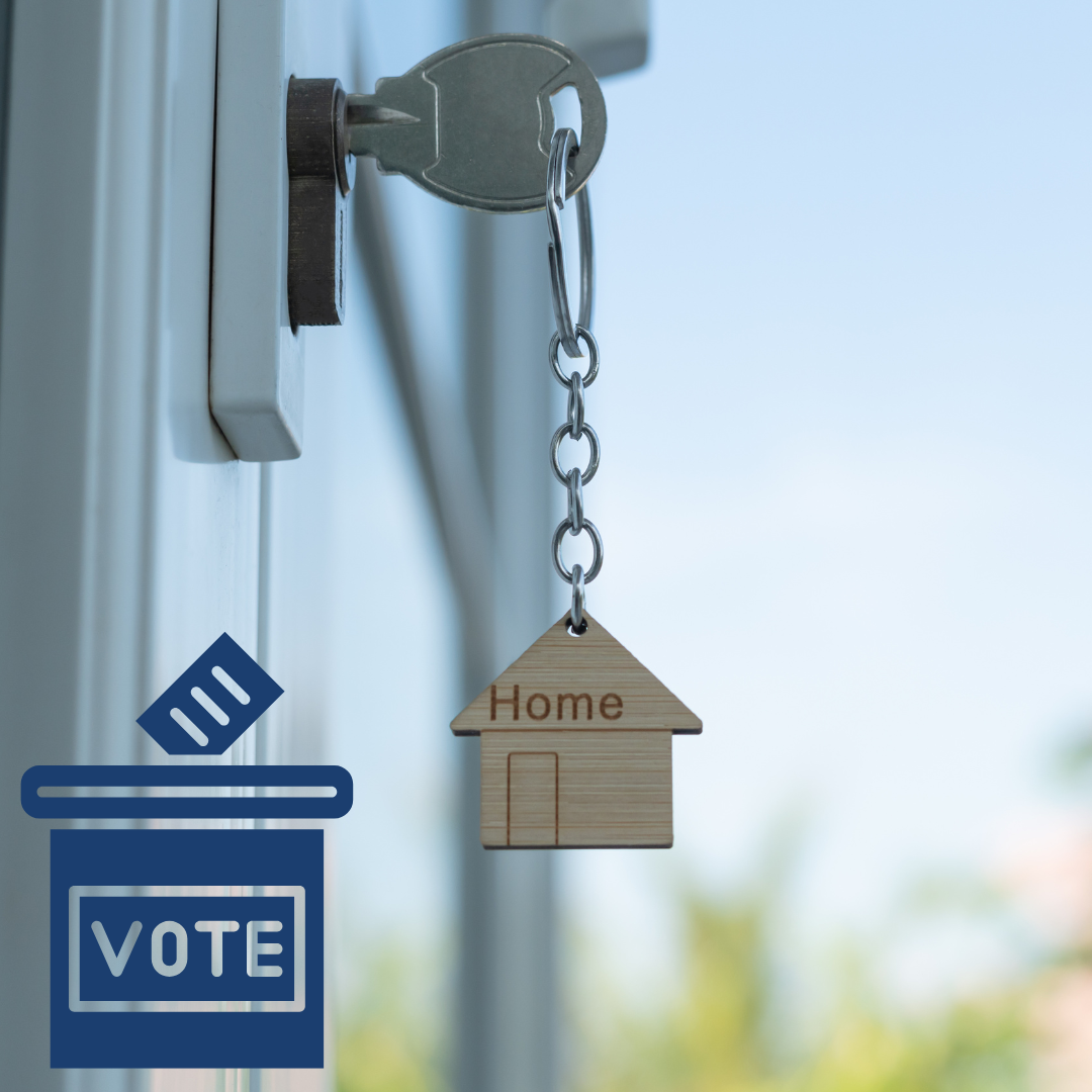 New home image depicting key in door with small house on keychain