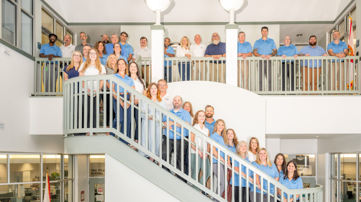 Photo of entire St. Johns County Property Appraiser's Office team on stairs; 37 people in picture