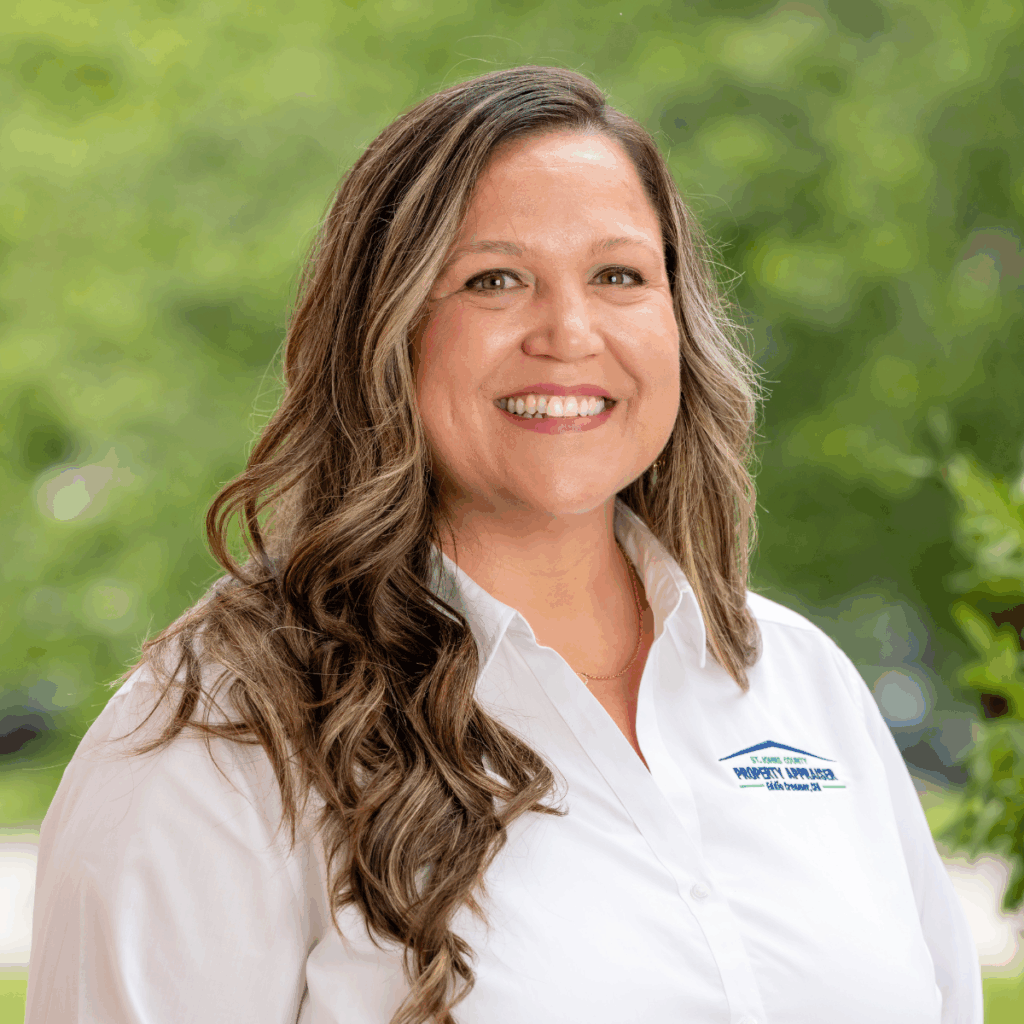Peggy with white shirt and greenery background