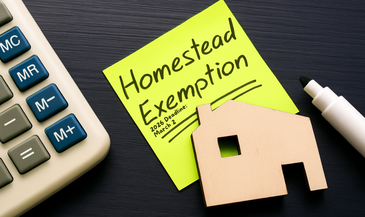 Calculator with wooden house and note that reads homestead exemption 2026 deadline: March 2