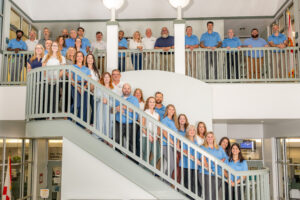 St. Johns County Property Appraiser's Office team standing along stairs